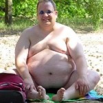 Fat man at the beach Fat man at the beach